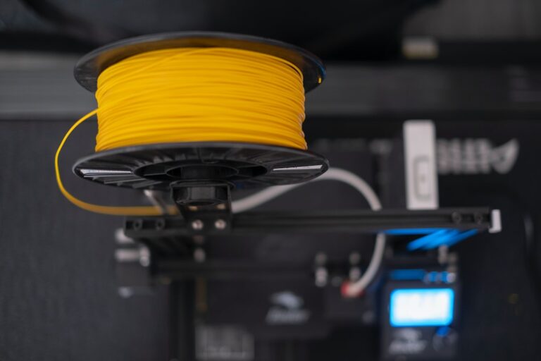 3D printer spool feeding into a 3D printer